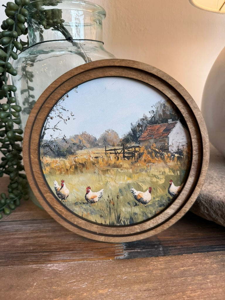 Round Chicken Framed Canvas Art featuring a classic farmhouse chicken illustration in a handcrafted round wood frame with an Early American finish.