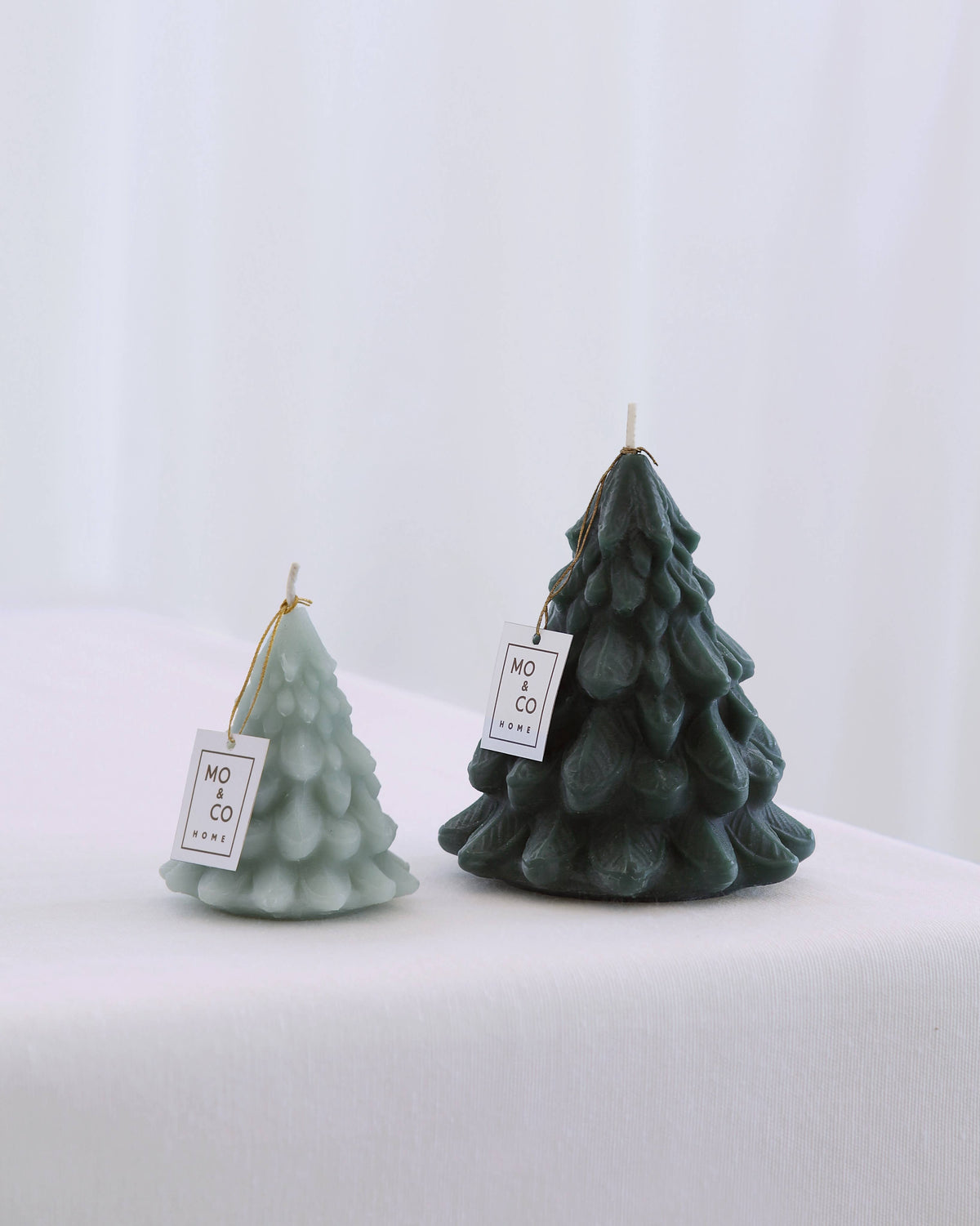 Sculpted Beeswax Tree Candle with intricate Christmas tree detailing inspired by vintage ornaments.