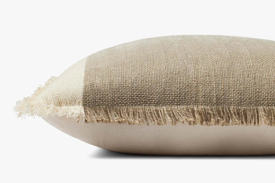 Close-up of the woven jute and cotton texture with fringe edging on the Amber Lewis Seraphina pillow.