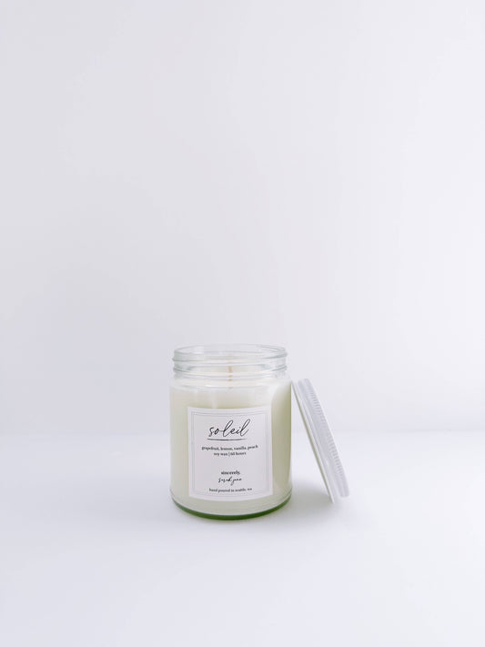 Soleil 8 oz soy candle with notes of grapefruit, peach, lemon, and vanilla.