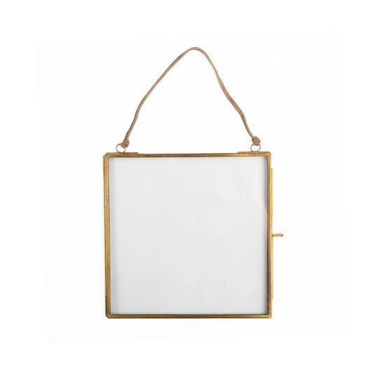 Square brass hanging picture frame measuring 7 by 7 inches with a brown suede hanging strap.