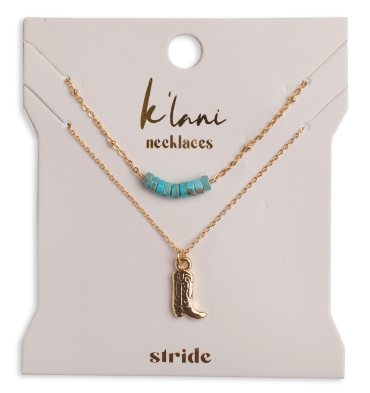 Stride two-piece gold necklace set with natural turquoise stone beads and a detailed cowboy boot pendant.