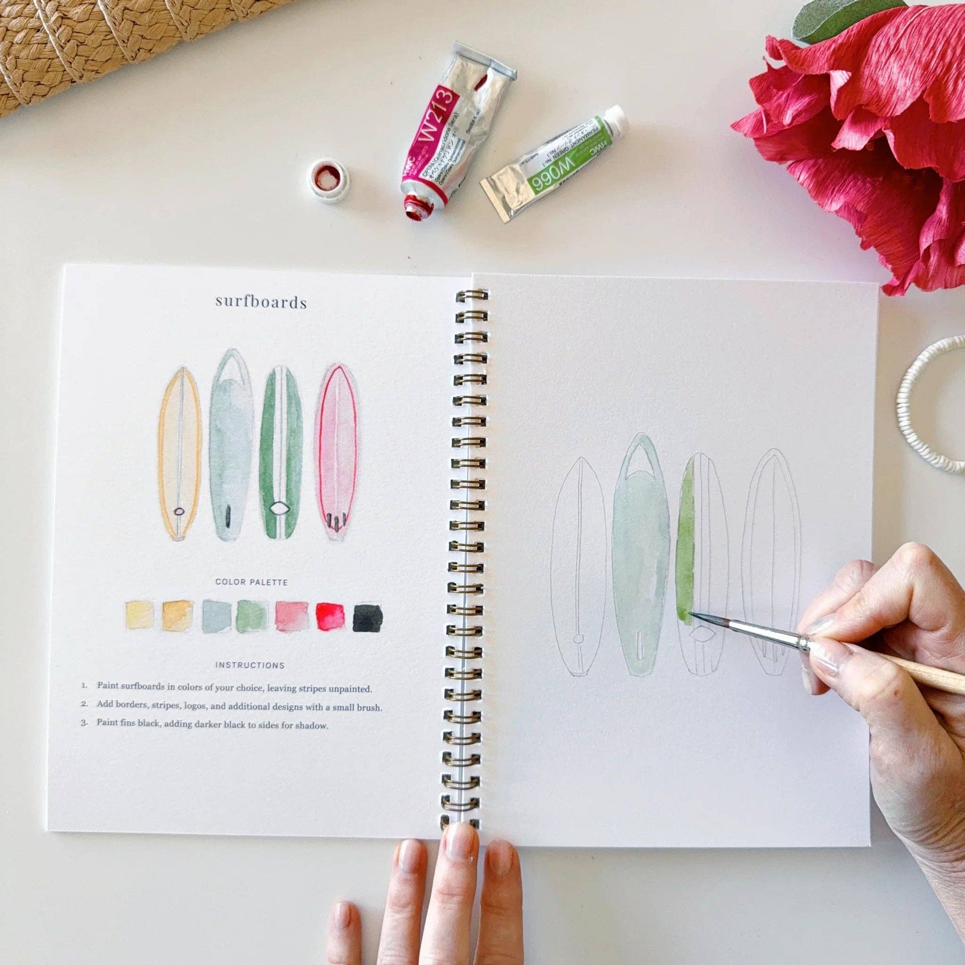 Beginner watercolor workbook designed for creative relaxation and tropical-inspired painting.