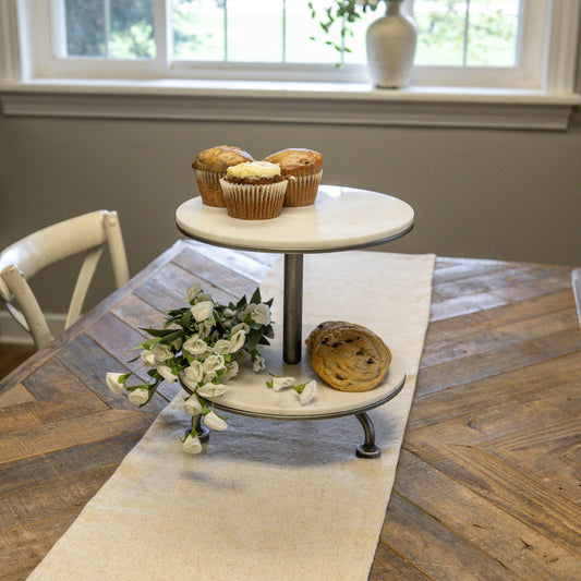 Two tier pewter and marble serving riser