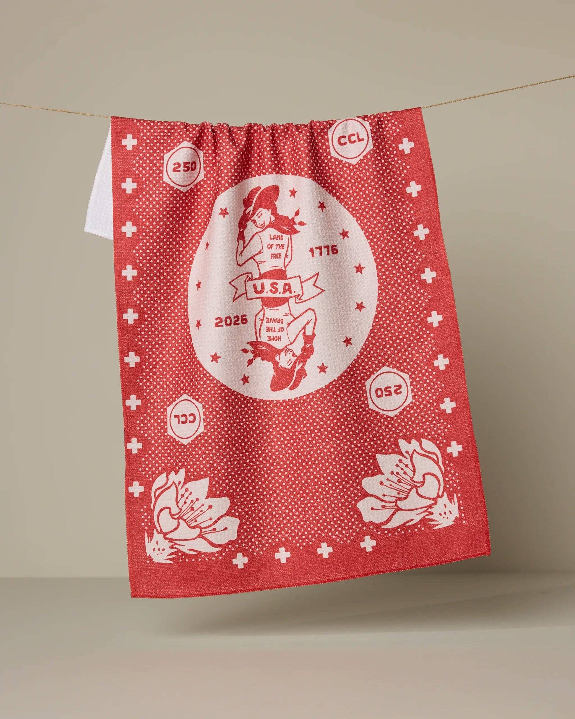 USA Cowgirl kitchen tea towel in red featuring a playful Western Americana-inspired design.