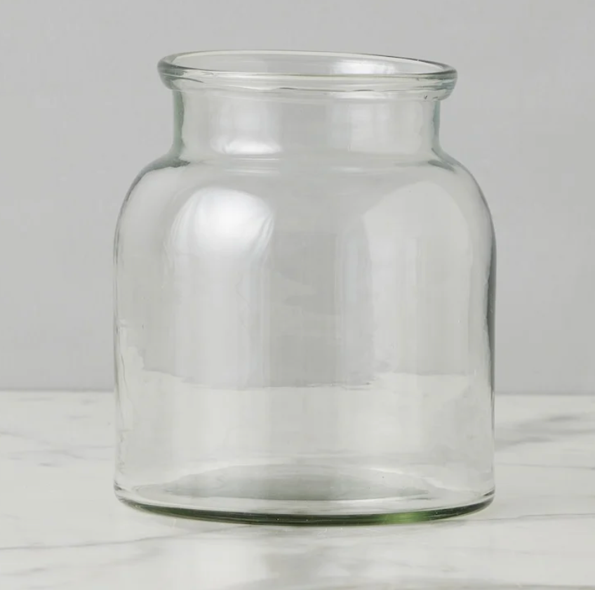 Clear glass jar on a white background