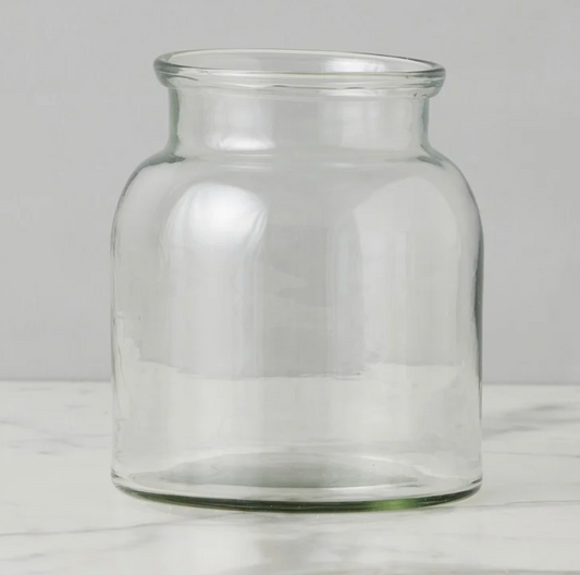 Clear glass jar on a white background
