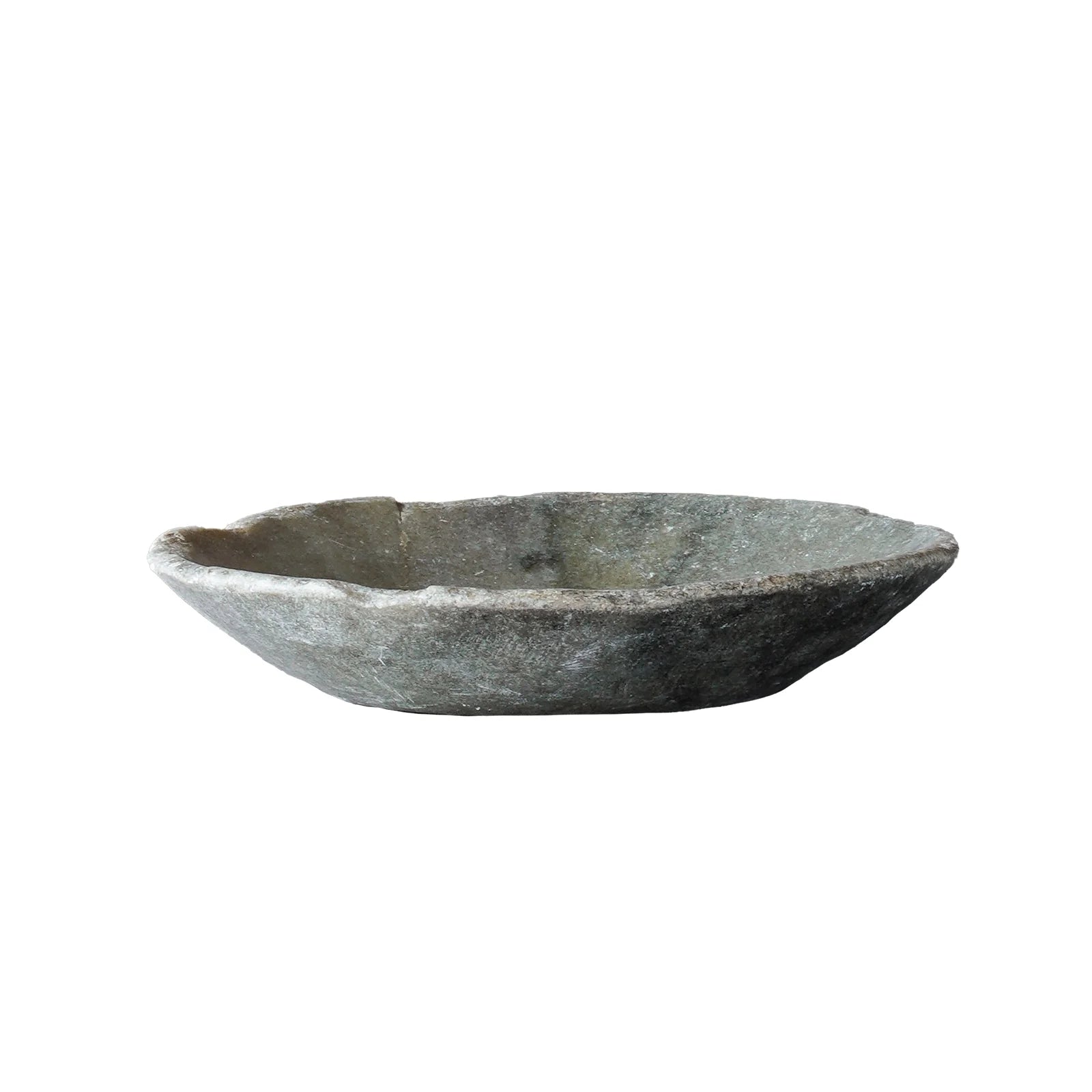Small vintage round marble bowl with natural veining, timeworn markings, and a softly irregular shape.