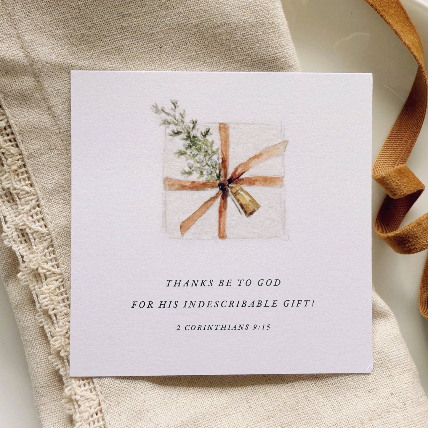 Close-up of Christmas Scripture cards printed on premium 120 lb cotton eggshell textured paper with original watercolor artwork and encouraging Bible verses.