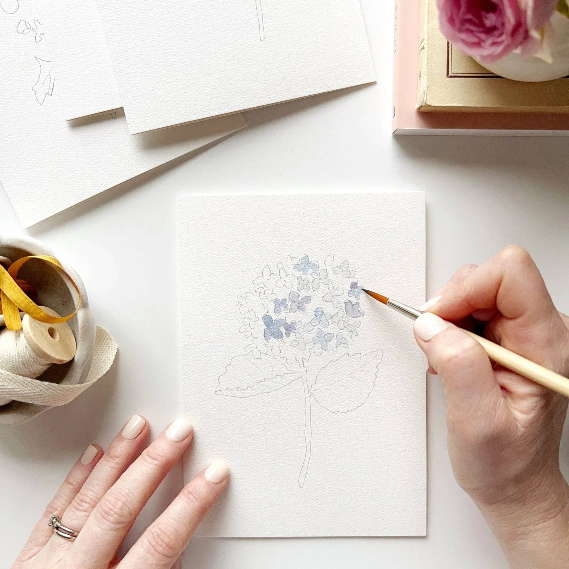 Botanical watercolor notecard set with beginner-friendly painting instructions.