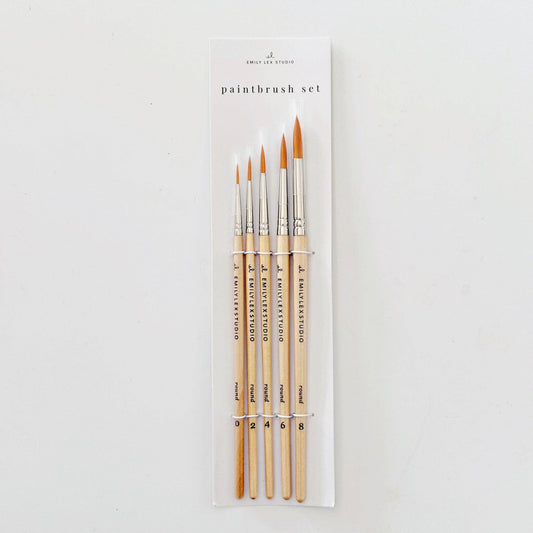 Set of five watercolor paintbrushes with wood handles and synthetic Taklon bristles.