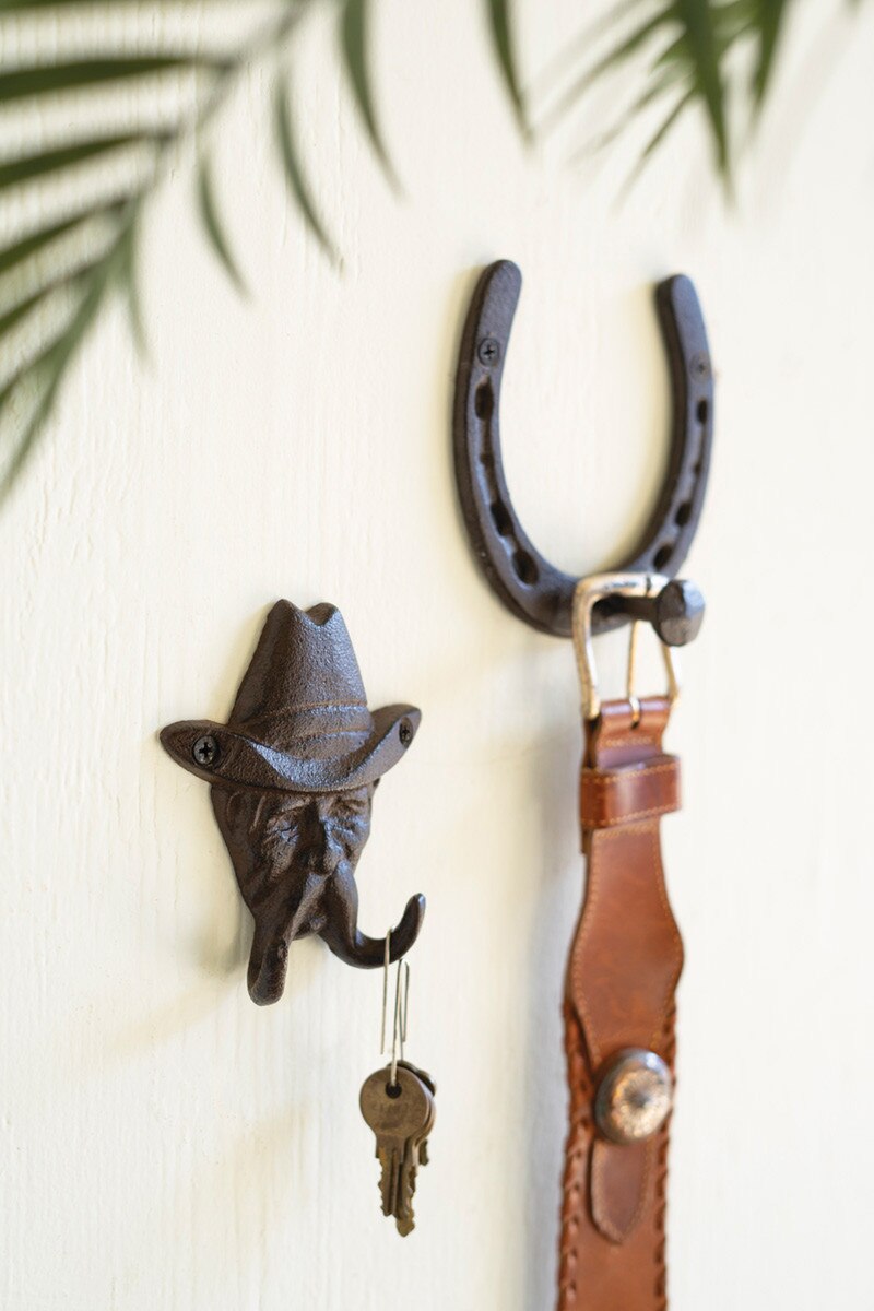 Rustic cowboy wall hook displayed in a mudroom, adding functional storage and timeless ranch-inspired character.
