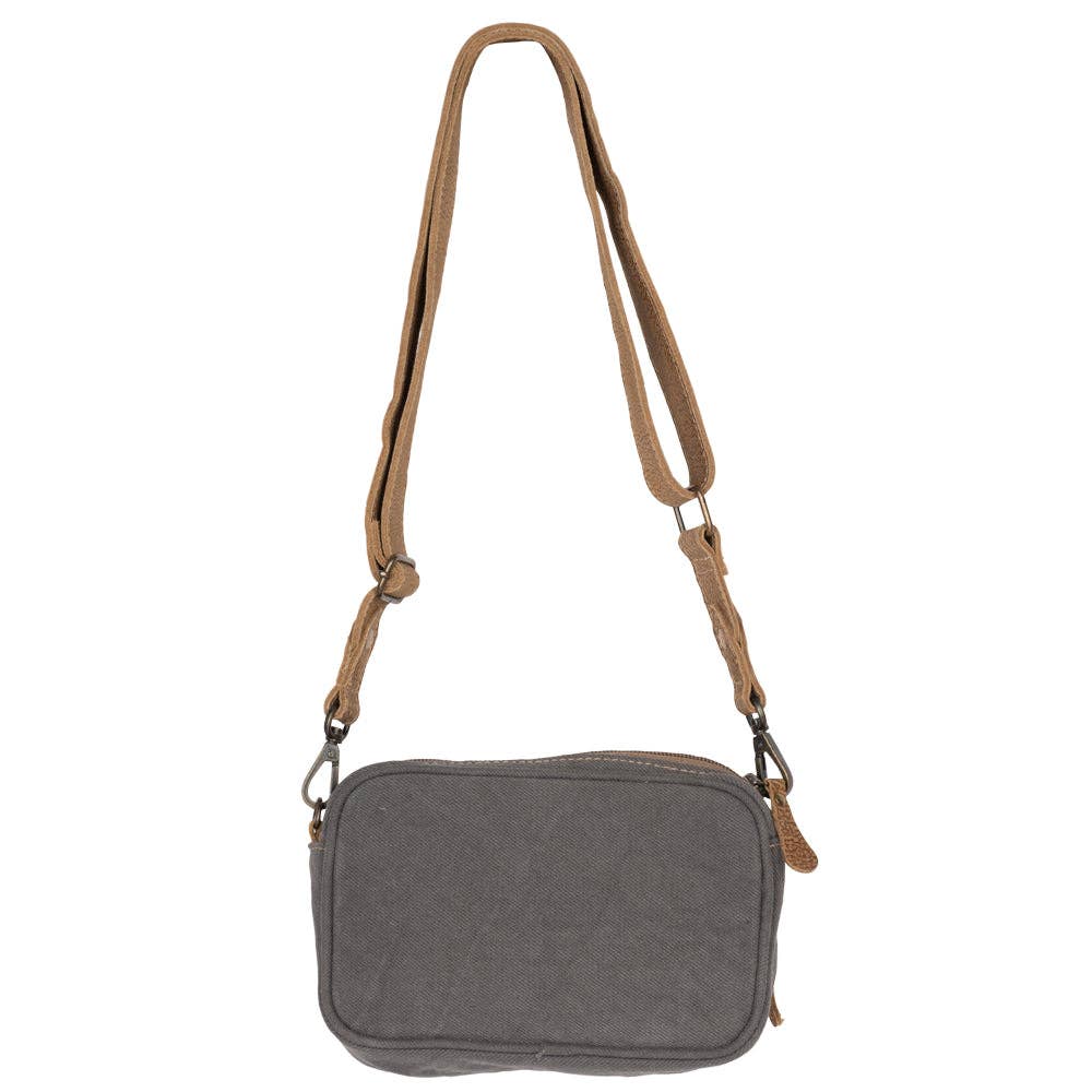 Western woven canvas and leather crossbody bag with artisan-inspired detailing