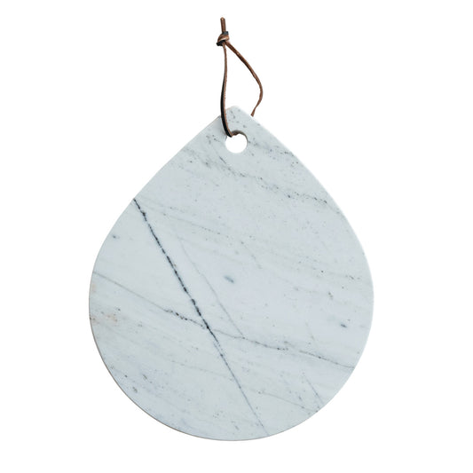 White mélange marble cheese and cutting board with handle and leather hanging tie.