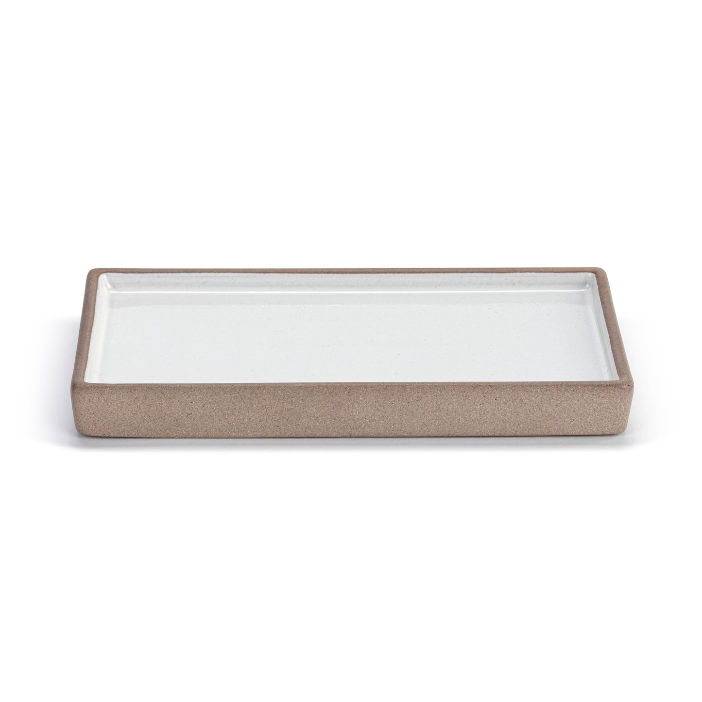 White and natural rectangular ceramic catchall tray.